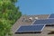 Solar panel system with attic junction box and trees