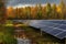 Solar panels in the autumn forest. Photovoltaic modules for renewable electric production. Generative AI