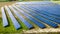 Solar panels on field. Photovoltaic farm in Poland. Renewable energy