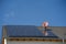 Solar panels on a flat roof in the sunshine