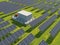 Solar panels on the grass. Solar power plant. Alternative source of electricity. Solar farm. 3d rendering illustration