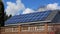 Solar Panels on a home in a neighborhood covering most of the roof