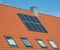 Solar panels on a orange roof