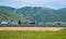 Solar panels, photovoltaics, alternative electricity source. View of a solar station at the foothills of a mountain