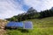 Solar panels with Strichkogel mountain between Grosser Donnerkogel and Angerstein in background, Alps, sunny summer day