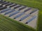 Solar Panels in summer field. Aerial Industrial View