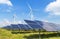 Solar panels and wind turbines in hybrid power plant systems station