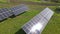 Solar photovoltaic panels mounted on stand-alone frame on backyard ground for generating of clean ecological electric