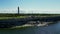 Solar power plant and Windmills aerial view, wind turbine in an offshore wind