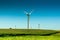 Solar power windmill on rolling countryside