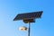 Solar powered city lamp isolated on blue sky