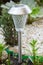 A solar-powered lamp in the garden