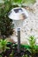 A solar-powered lamp in the garden