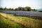 Solar system panels in the large photovoltaic power plant in the green field