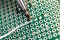 Soldering process, hot soldering iron and breadboard