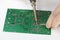 Soldering resistor to printed circuit board