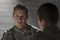 Soldier consoles peer with PTSD, horizontal