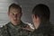 Soldier consoles peer with PTSD, horizontal