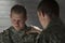 Soldier consoles peer with PTSD, horizontal