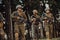 Soldier fighters standing together with guns. Group portrait of US army elite members, private military company