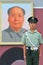 A soldier guards in front of the main entrance of Tiananmen Gate with Mao Zedong portrait at backgrounds, Beijing, China