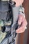 Soldier hands holding machine gun