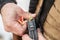 Soldier hands load rifle machine gun bullets into cartridge clip