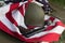 Soldier helmet, pistolt and grenade from the Second World War and the flag of the USA