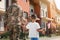 Soldier and his little son with American flag, back view. Veterans Day in USA