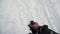 The soldier holds in his hand a training grenade while passing military exercises in the army, snow background. Clip. A