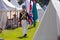 Soldier marching through a camp during a War of 18