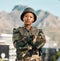 Soldier, portrait and black woman with arms crossed in city for power, confidence and mindset outdoors. War, combat and