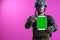 Soldier showing a tablet with a blank green screen