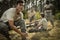 Soldier tying his shoe laces