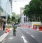 A soldier walking on street in Singapore