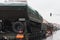 Soldiers of Czech Army are riding military truck with floating transporter