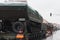 Soldiers of Czech Army are riding military truck with floating transporter