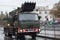 Soldiers of Czech Army are riding universal finishing machine on military parade