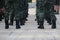 Soldiers line up to pay tribute to the national flag at the Outdoor Battalion