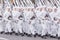 Soldiers skiers in white winter camouflage suits parade across the square