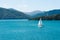 A solely sailing boat at the Marlboro sound, New Zealand