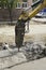A solid body hammer and hydraulic breaker for asphalt, skid steers, backhoe-loaders and excavators. The machine for construction a