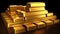 Solid gold bullion bars in a stack inside a bank vault