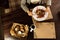 A solid lady sits at a table in a luxurious restaurant