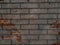 A solid piece of brown brick wall. brickwork for the background or texture  sometimes the brickwork is destroyed