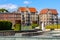 Solidarnosci square and surrounding tenement houses in old Gdansk Shipyard quarter in front of European Solidarity Centre in