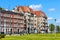 Solidarnosci square and surrounding tenement houses in old Gdansk Shipyard quarter in front of European Solidarity Centre in