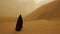 A solitary figure cloaked in black trudges across the scorching sand dunes their purpose unknown.