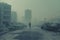 Solitary figure walking in a misty urban wasteland with abandoned cars