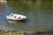 Solitary fishing boat floating on the river